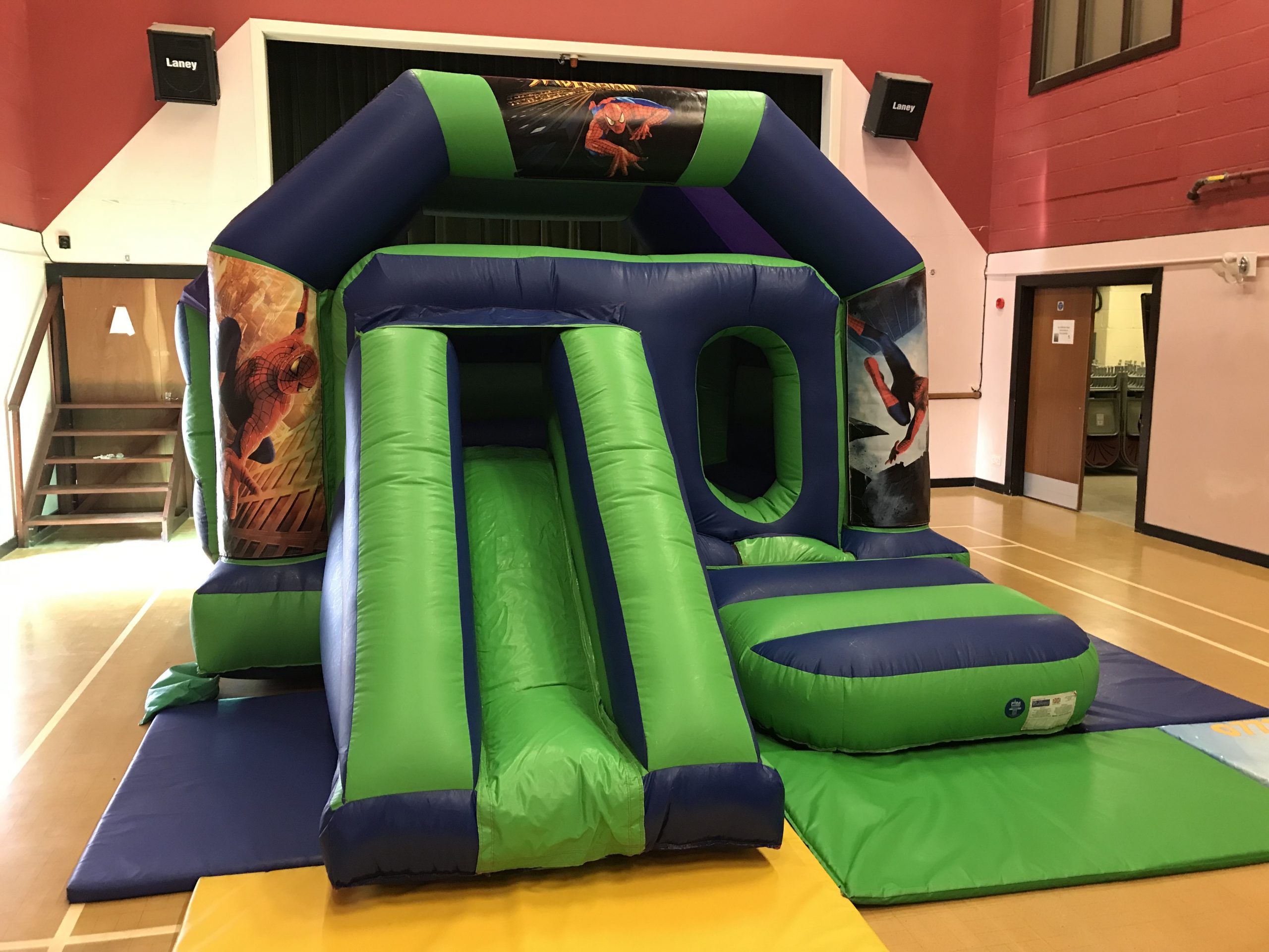 Castle with slide & artwork A10 Bouncy Castles